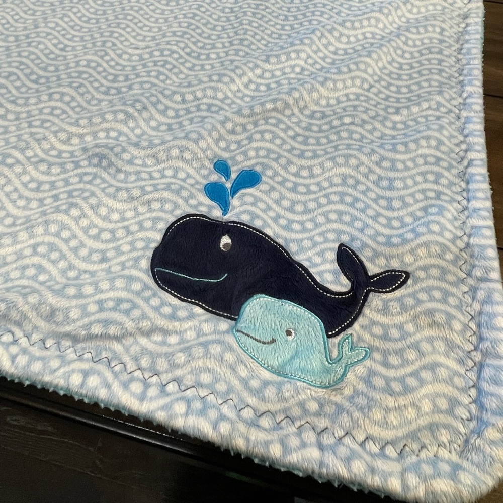 Baby blanket with whale design